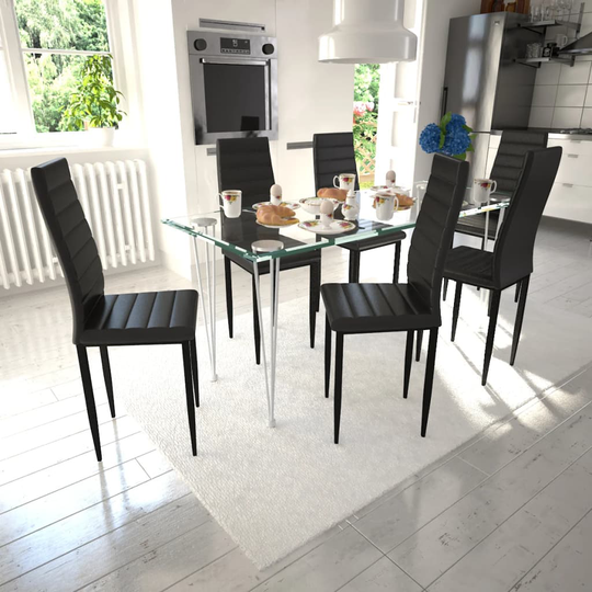 Matbord i glas med 6 st svarta slimmade stolar